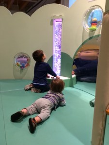 Brothers looking at the bubbles